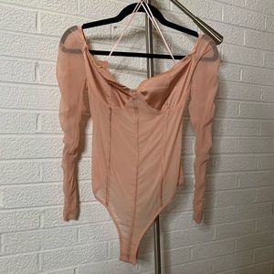 Pink sheer body suit